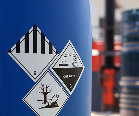 Labels to identify hazardous materials in shipping containers